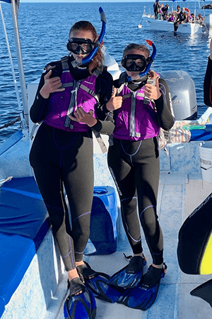 Two people ready to snorkel 