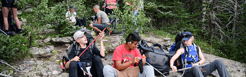 Students taking a break after hiking